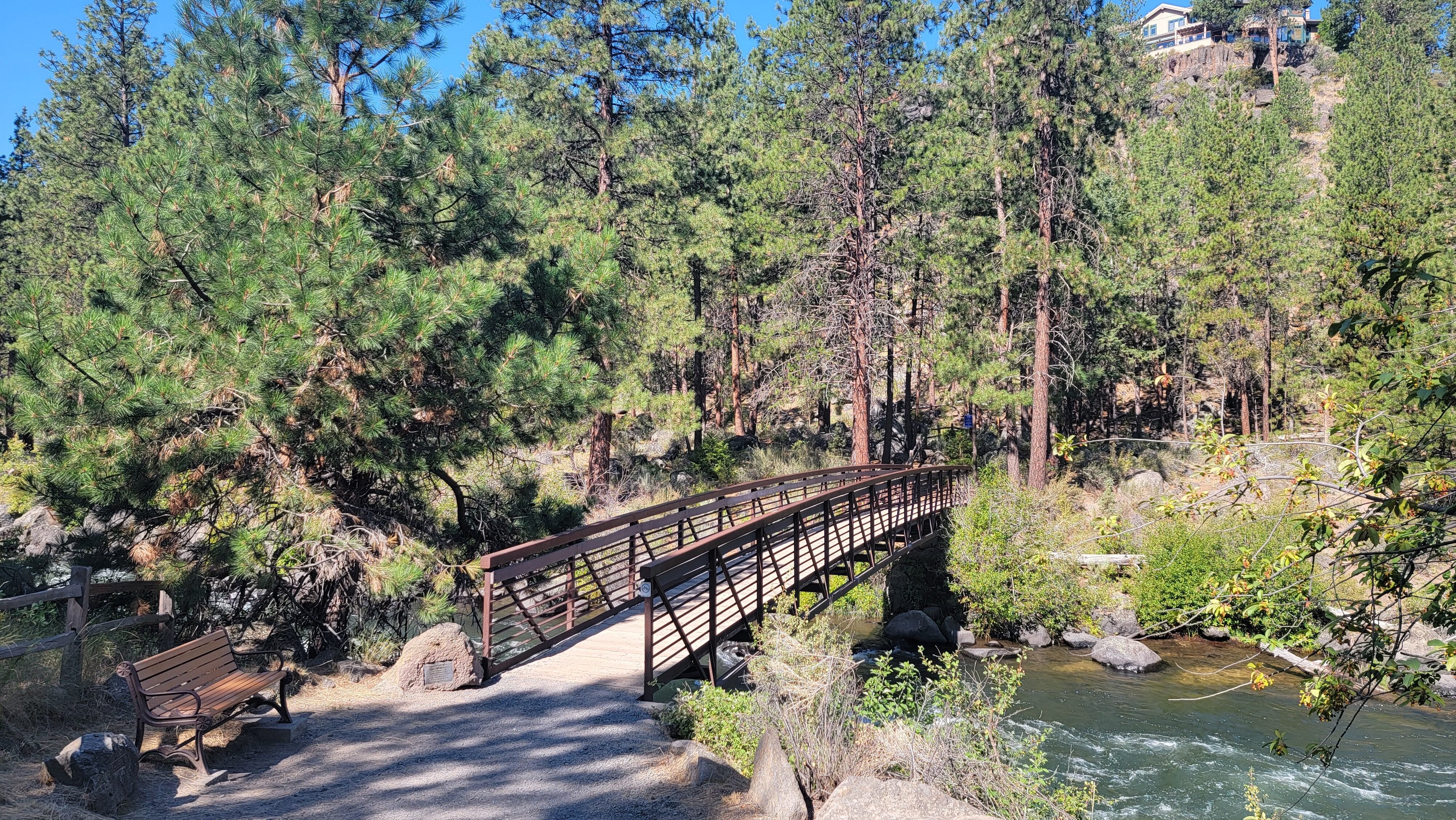 A view of a deschutes river trail bridge spanning the deschutes river