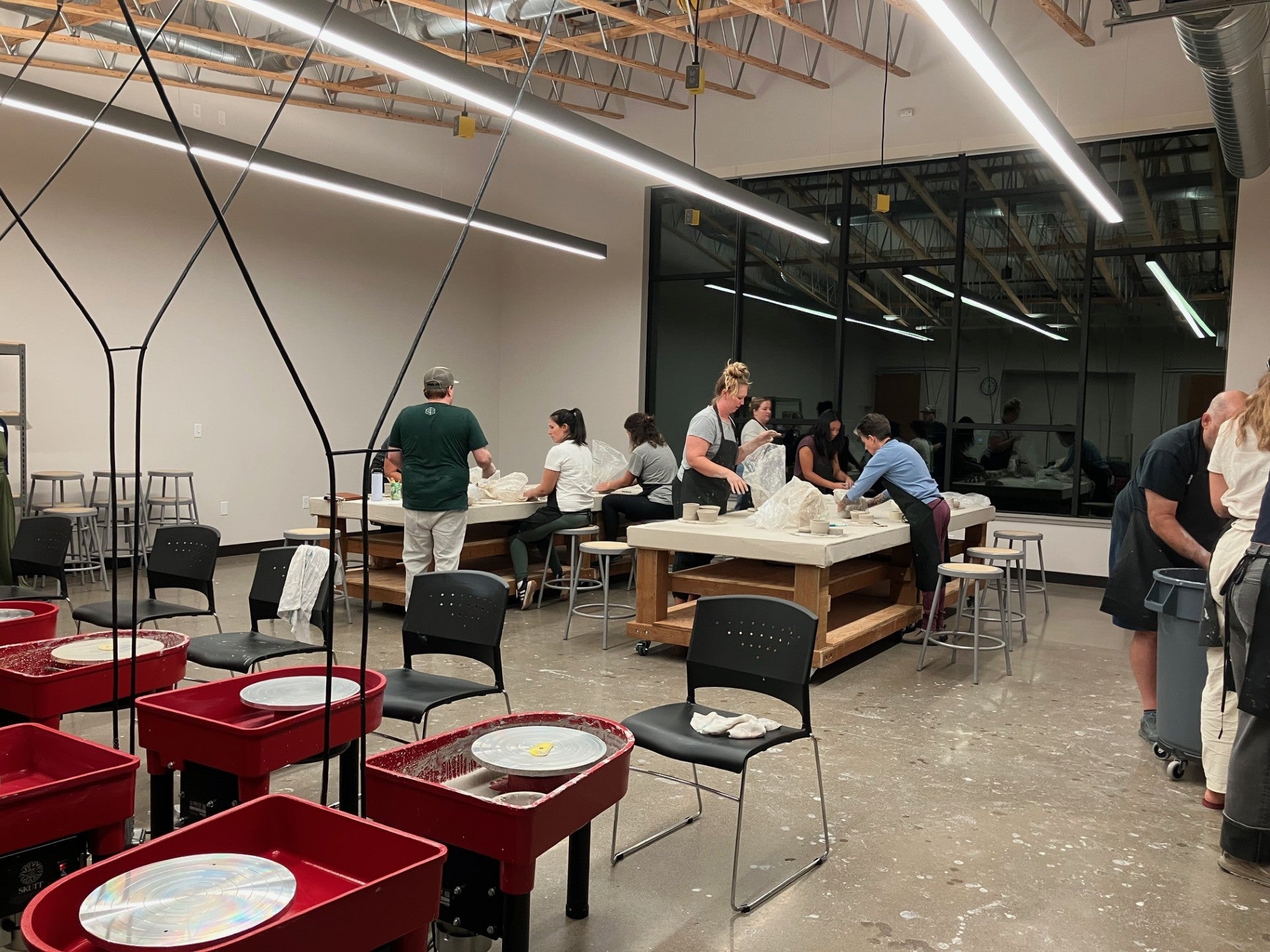 clay classroom with participants working on projects at tables