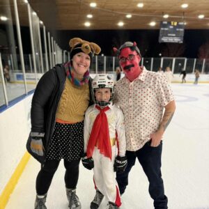 Three costumed skaters at Halloween Skate